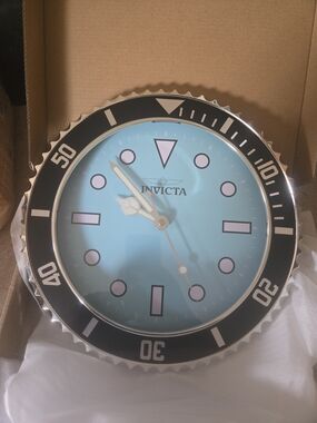 Invicta Aqua Turquoise Wall Clock with Black Bezel